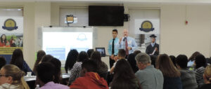Students at Colonial High School gather during a kick-off event to learn about the Elevation Scholars Program.